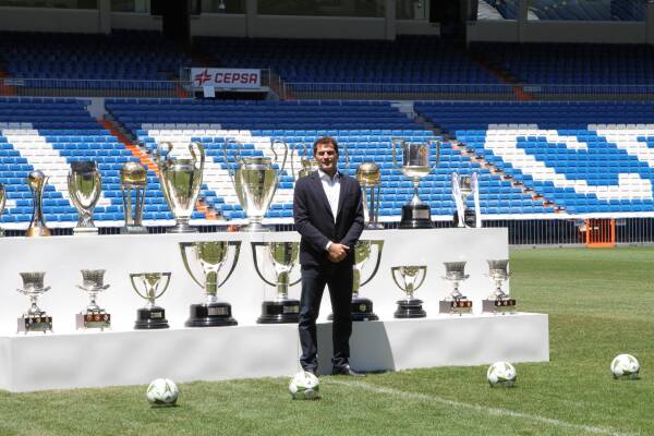 Departing Real Madrid captain and goalkeeper Iker Casillas waves to supporters at an official send o