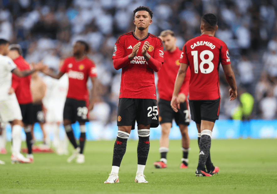 LONDON, ENGLAND - AUGUST 19: Jadon Sancho of Manchester United applauds the fans following the team's defeat during the Premier League match between Tottenham Hotspur and Manchester United at Tottenham Hotspur Stadium on August 19, 2023 in London, England. (Photo by Julian Finney/Getty Images)